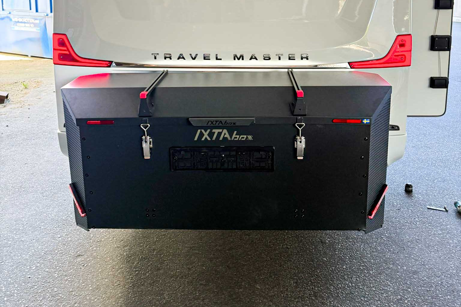 IXTAbox Caravan cargo box on touring caravan, smart travel storage for vans and caravans